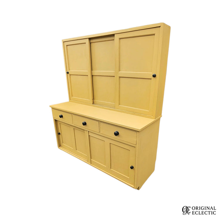 Large mustard yellow antique pine housekeepers cupboard