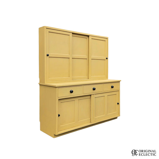Large mustard yellow antique pine housekeepers cupboard
