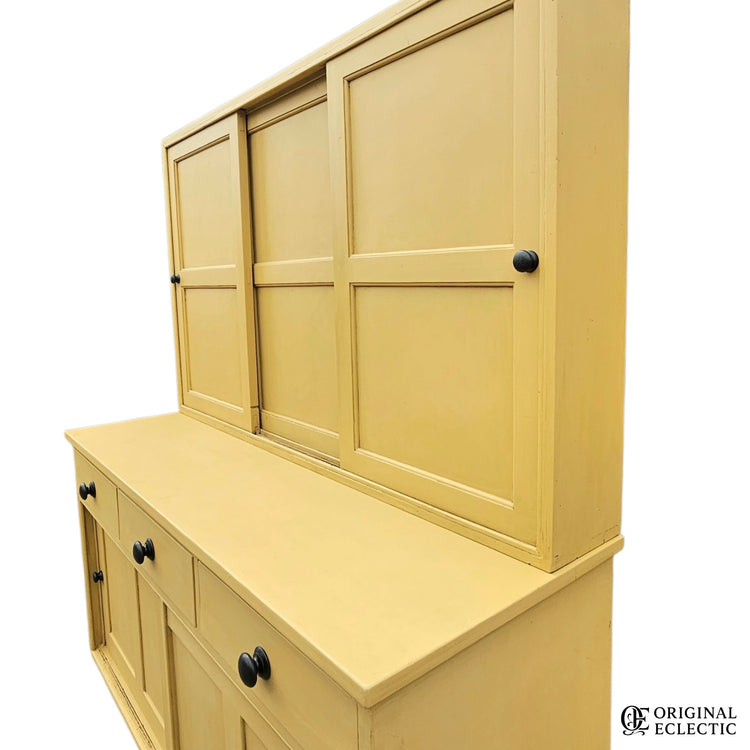 Large mustard yellow antique pine housekeepers cupboard