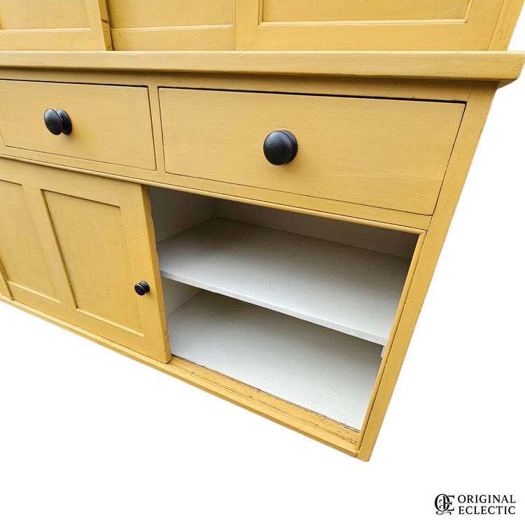 Large mustard yellow antique pine housekeepers cupboard