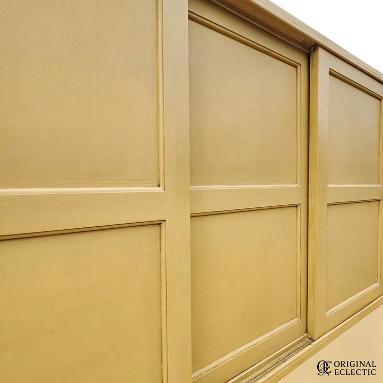 Large mustard yellow antique pine housekeepers cupboard