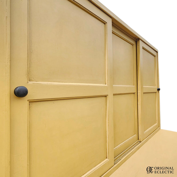 Large mustard yellow antique pine housekeepers cupboard
