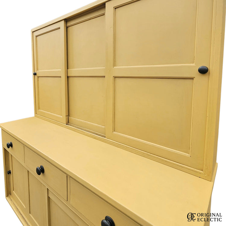 Large mustard yellow antique pine housekeepers cupboard