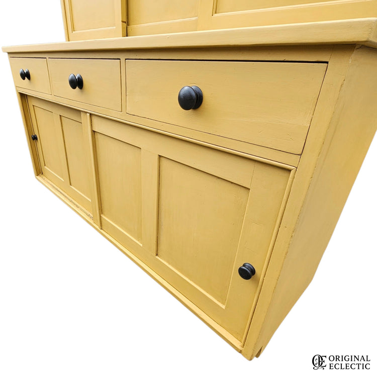 Large mustard yellow antique pine housekeepers cupboard